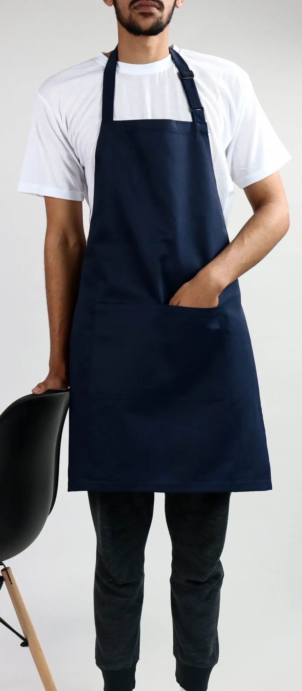 Man Wearing Navy Apron