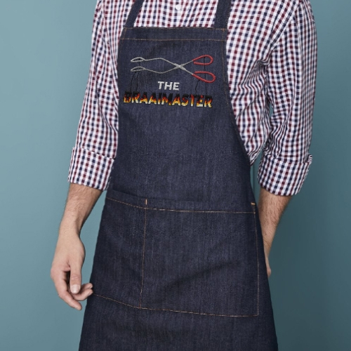 Man Wearing Navy Apron